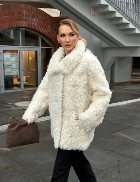 Белая шубка из тиградо - фото 18